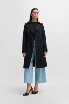 Double-breasted trench coat with buckled belt