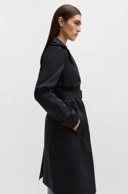 Double-breasted trench coat with buckled belt