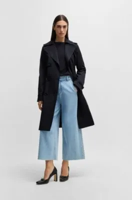 Double-breasted trench coat with buckled belt